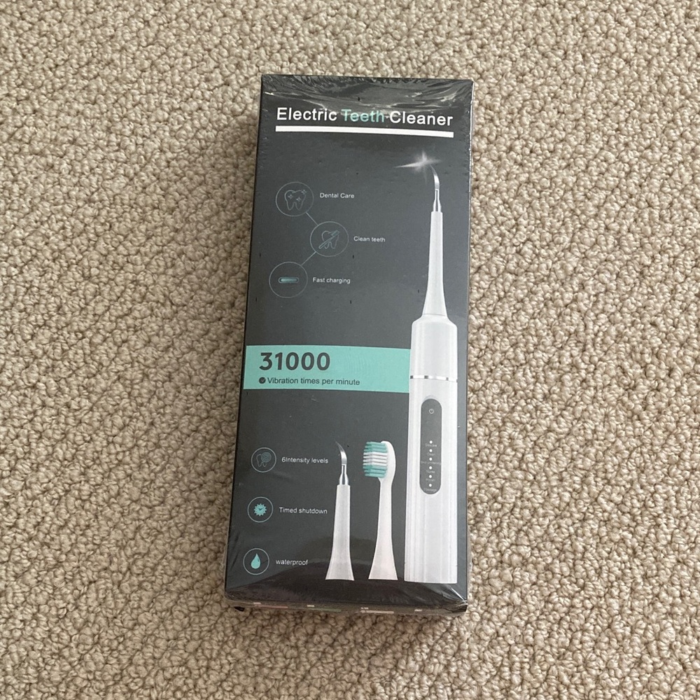 NEW Electric Teeth Cleaner Toothbrush Multi-Tool 6 Intensity Levels NIB SEALED